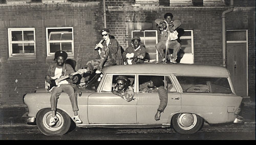 Creation Rebel, Harlesden 1979: Back Row - Dr Pablo, "Crucial" Tony, Style Scott. Front Row: Lizard, Mr Magoo, Desmond "Fat Fingers" Coke